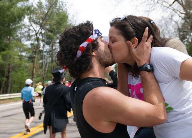     The students of Wellesley College have a long tradition of cheering on Boston marathoners. Known as the Wellesley Scream Tunnel, the quarter-mile stretch is a deafening gauntlet of high fives and, of course, kisses. Here, sophomore Megan Garratt-Reed is taken up on her offer by an eager runner.